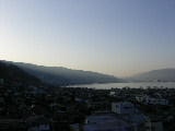 ̐zK